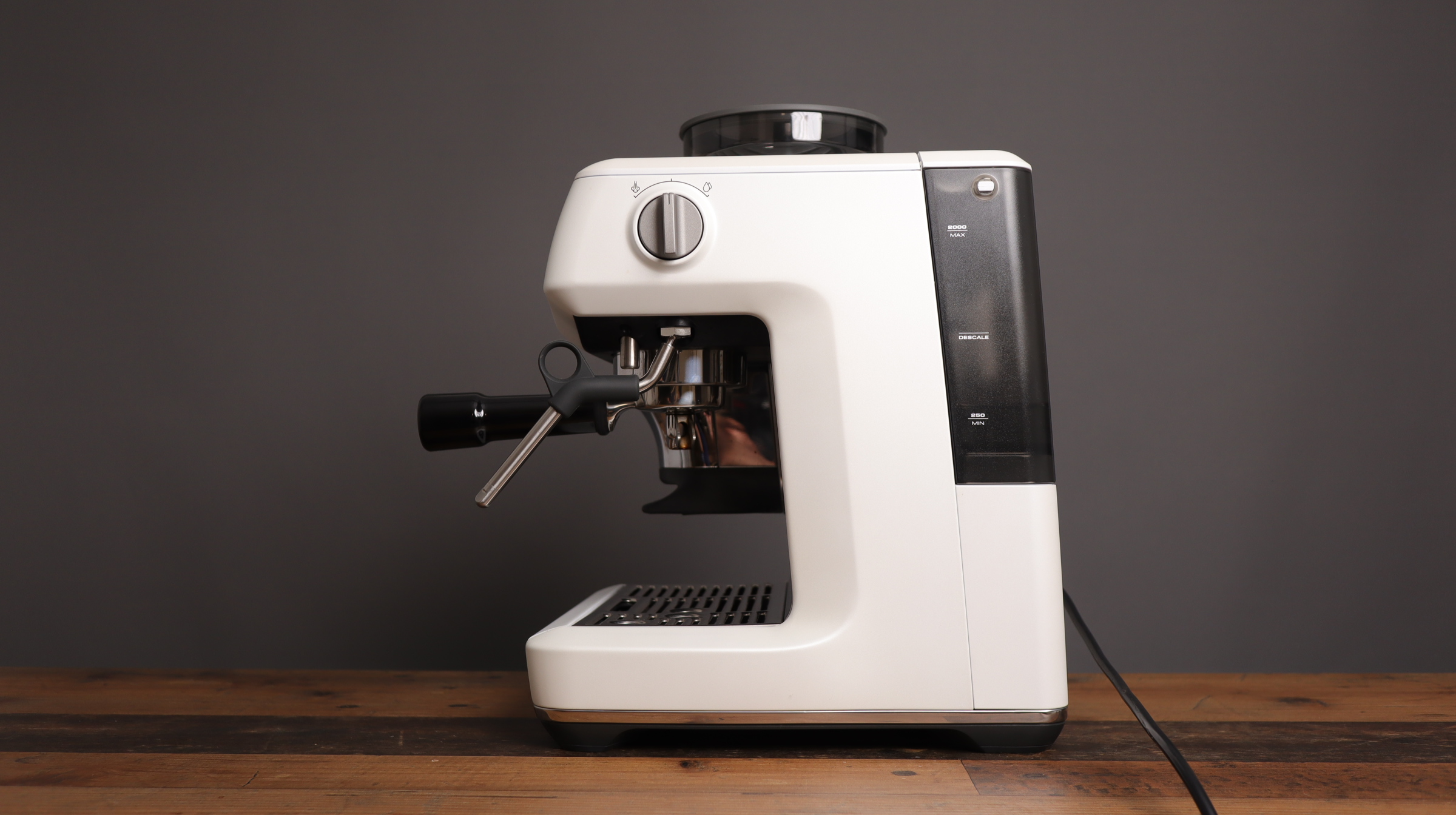 Right side view of Breville Barista Express Impress with steam lever and wand
