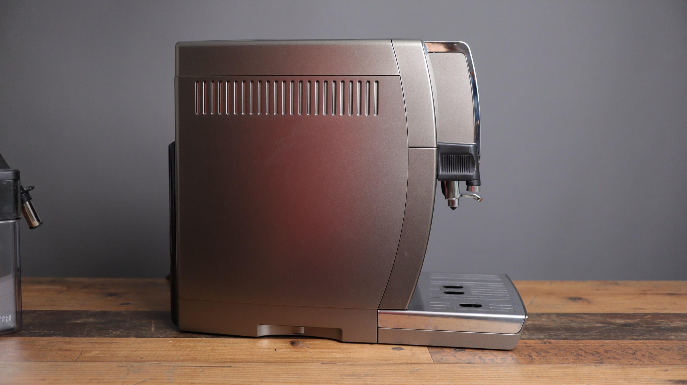 Delonghi Dinamica Plus shown from the left side.