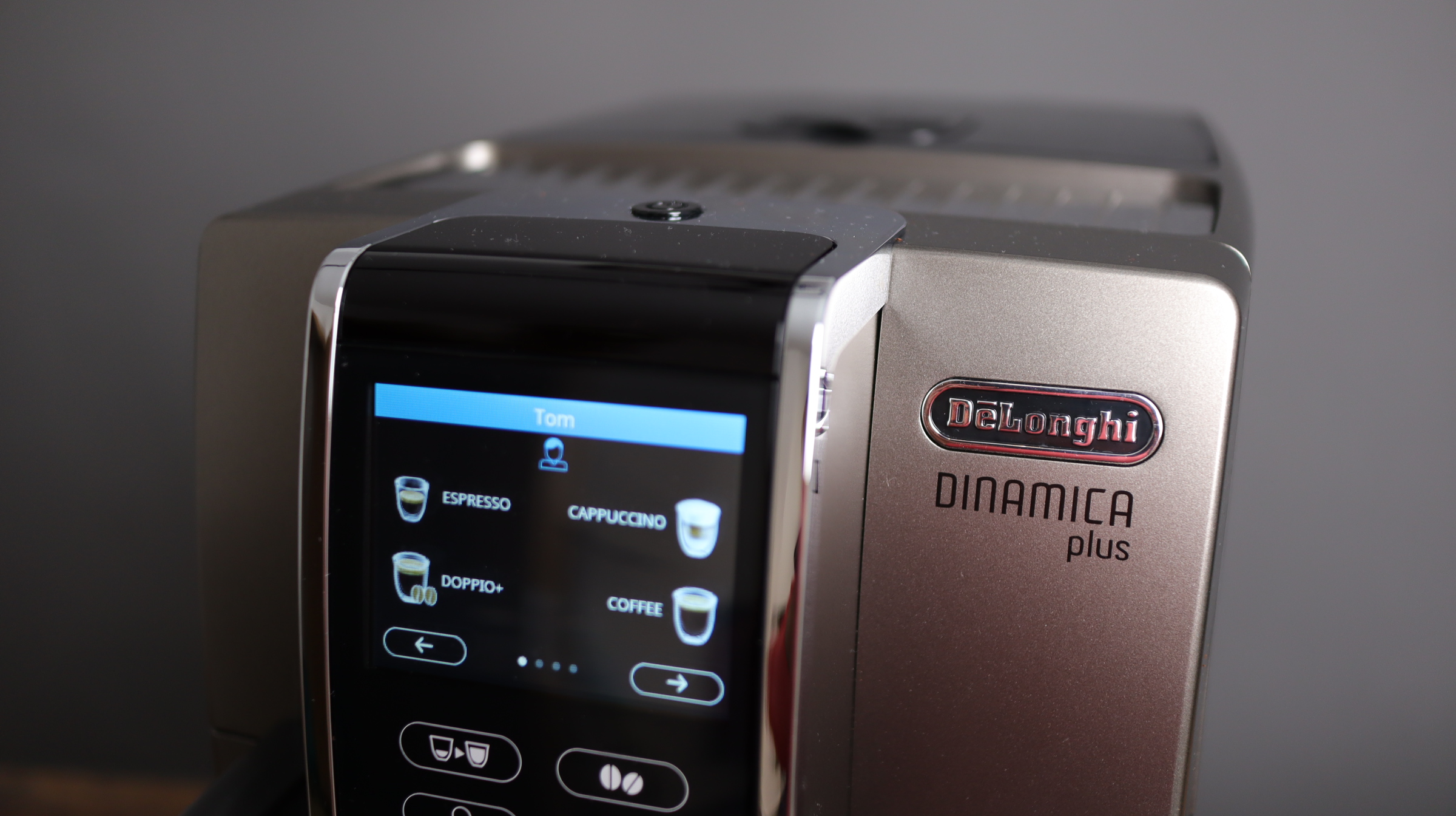 Delonghi Dinamica Plus shown with color and touch display, with drinks displayed, and profiles.