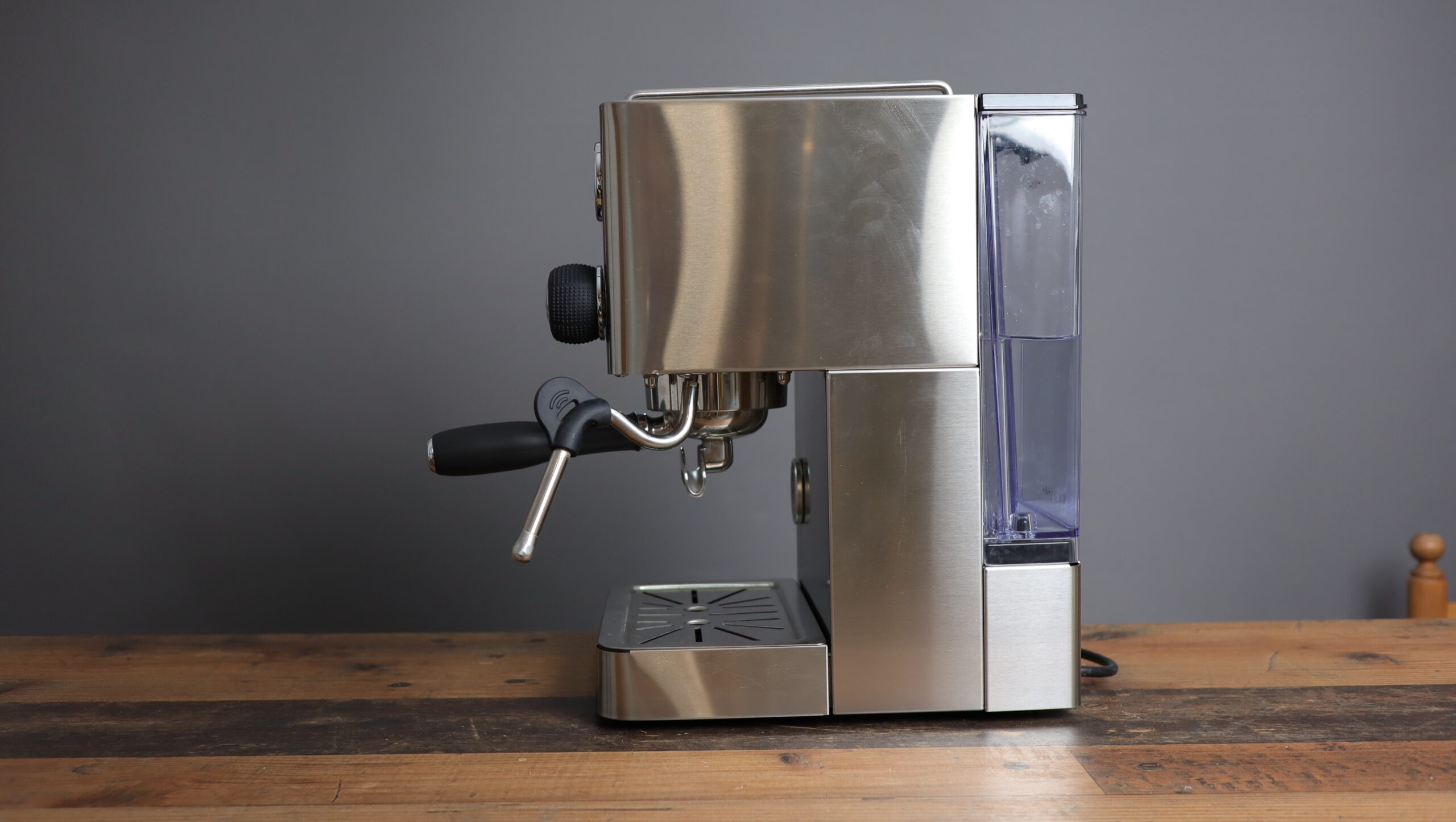 The MiiCoffee Apex viewed from the right, with articulating steam wand