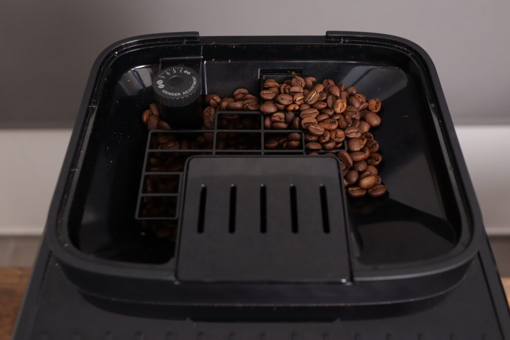 Bean hopper and grind adjustment on the Delonghi Magnifica Evo